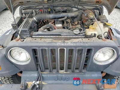 Zdjęcie 11 z 12 samochodu: 2000 JEEP WRANGLER / TJ SPORT VIN:1J4FA49S2YP754758 - miniatura