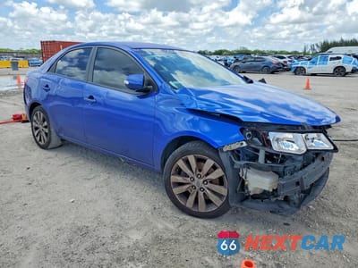 Czwarte zdjęcie samochodu z boku: 2010 KIA FORTE SX VIN:KNAFW4A3XA5287874 - miniatura