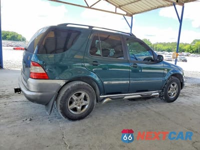 Trzecie zdjęcie samochodu z tyłu: 1999 MERCEDES-BENZ ML 320 VIN:4JGAB54E4XA100703 - miniatura