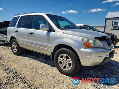 Czwarte zdjęcie samochodu z boku: 2005 HONDA PILOT EX VIN:2HKYF18415H535511 - miniatura