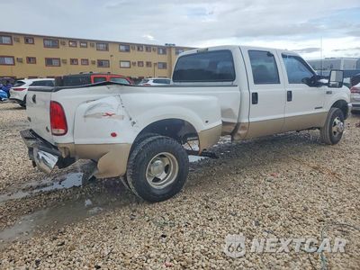 Trzecie zdjęcie samochodu z tyłu: 1999 FORD F350 SUPER DUTY VIN:1FTWW33FXXEE22509 - miniatura