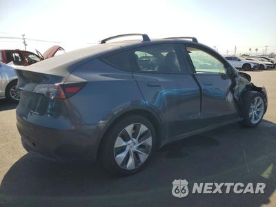 Trzecie zdjęcie samochodu z tyłu: 2022 TESLA MODEL Y VIN:7SAYGAEE1NF558671 - miniatura