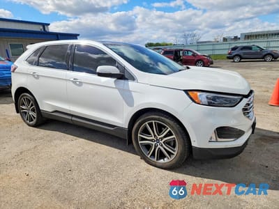 Czwarte zdjęcie samochodu z boku: 2020 FORD EDGE TITANIUM VIN:2FMPK4K96LBB42069 - miniatura