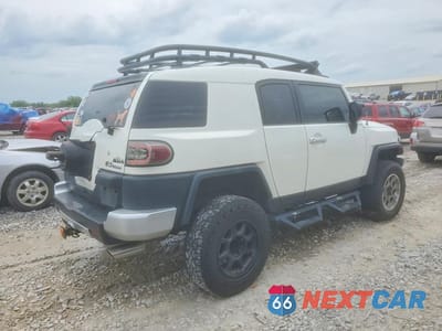 Trzecie zdjęcie samochodu z tyłu: 2011 TOYOTA FJ CRUISER BASE VIN:JTEBU4BFXBK104312 - miniatura