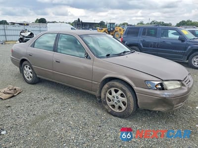Czwarte zdjęcie samochodu z boku: 1999 TOYOTA CAMRY LE V6 VIN:JT2BF22K8X0192742 - miniatura