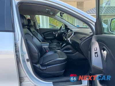 Piąte zdjęcie samochodu w środku: 2012 HYUNDAI TUCSON GLS VIN:KM8JUCAC4CU395912 - miniatura