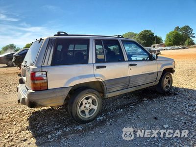 Trzecie zdjęcie samochodu z tyłu: 1998 JEEP GRAND CHEROKEE LAREDO VIN:1J4FX58S5WC340903 - miniatura