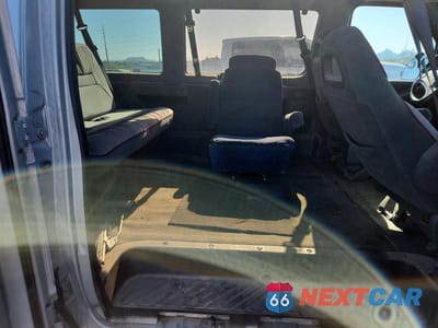 Zdjęcie 11 z 14 samochodu: 1994 FORD ECONOLINE E350 VIN:1FMHE31G8RHA46137 - miniatura