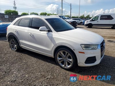Czwarte zdjęcie samochodu z boku: 2016 AUDI Q3 PREMIUM PLUS VIN:WA1EFCFS0GR010915 - miniatura