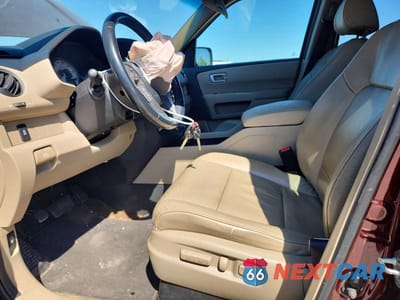 Zdjęcie 7 z 13 samochodu: 2014 HONDA PILOT EXLN VIN:5FNYF4H7XEB039004 - miniatura