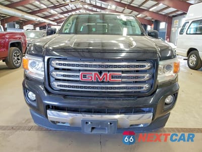 Piąte zdjęcie samochodu w środku: 2016 GMC CANYON SLE VIN:1GTP6CE12G1234645 - miniatura