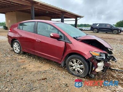 Czwarte zdjęcie samochodu z boku: 2010 HONDA INSIGHT EX VIN:JHMZE2H71AS028142 - miniatura