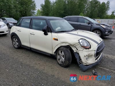 Czwarte zdjęcie samochodu z boku: 2016 MINI COOPER VIN:WMWXU1C57G2D11200 - miniatura