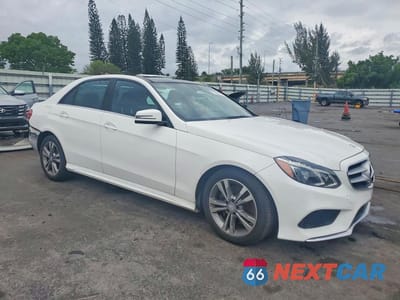 Czwarte zdjęcie samochodu z boku: 2016 MERCEDES-BENZ E 250 BLUETEC VIN:WDDHF9HB5GB204163 - miniatura