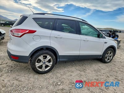 Trzecie zdjęcie samochodu z tyłu: 2016 FORD ESCAPE SE VIN:1FMCU0GXXGUC11824 - miniatura