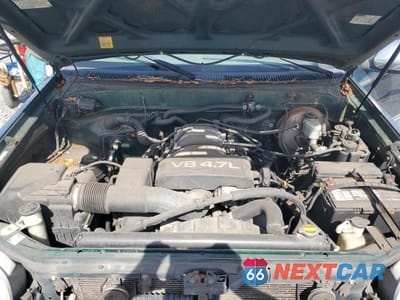Zdjęcie 11 z 12 samochodu: 2000 TOYOTA TUNDRA SR5 VIN:5TBRT3416YS050356 - miniatura