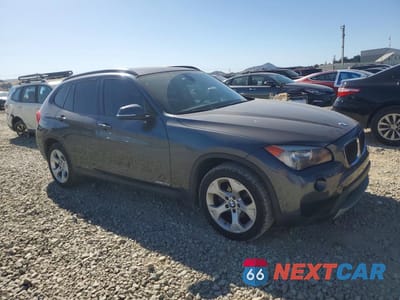 Czwarte zdjęcie samochodu z boku: 2014 BMW X1 SDRIVE28I VIN:WBAVM1C52EVW53637 - miniatura