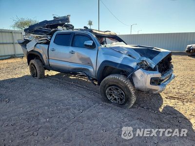 Czwarte zdjęcie samochodu z boku: 2018 TOYOTA TACOMA TRD OFF-ROAD VIN:3TMDZ5BN6JM042135 - miniatura