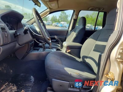 Zdjęcie 7 z 12 samochodu: 2004 JEEP GRAND CHEROKEE LAREDO VIN:1J4GW48S64C133922 - miniatura