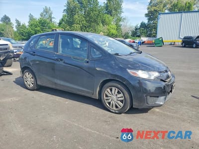 Czwarte zdjęcie samochodu z boku: 2016 HONDA FIT LX VIN:JHMGK5H50GX003650 - miniatura