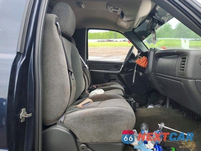 Zdjęcie 10 z 12 samochodu: 2005 CHEVROLET SILVERADO VIN:1GCEK14T35E183687 - miniatura