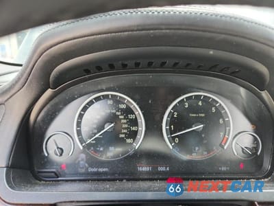 Zdjęcie 9 z 12 samochodu: 2013 BMW 750 XI VIN:WBAYB6C55DC997991 - miniatura