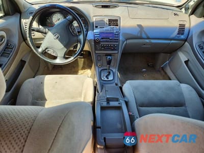 Zdjęcie 8 z 12 samochodu: 2002 NISSAN MAXIMA GXE VIN:JN1DA31D82T420756 - miniatura