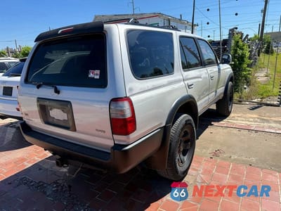 Czwarte zdjęcie samochodu z boku: 1997 TOYOTA 4RUNNER SR5 VIN:JT3HN86R1V0067663 - miniatura