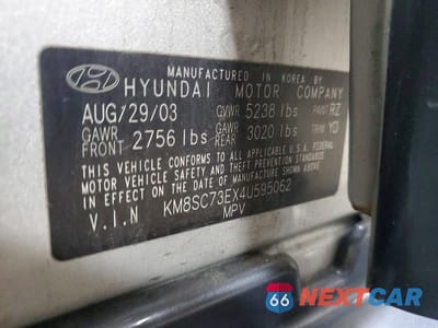 Zdjęcie 13 z 13 samochodu: 2004 HYUNDAI SANTA FE GLS VIN:KM8SC73EX4U595062 - miniatura