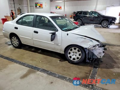 Czwarte zdjęcie samochodu z boku: 2002 NISSAN SENTRA XE VIN:3N1CB51D62L587478 - miniatura