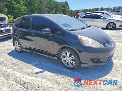 Czwarte zdjęcie samochodu z boku: 2009 HONDA FIT SPORT VIN:JHMGE88419S027603 - miniatura