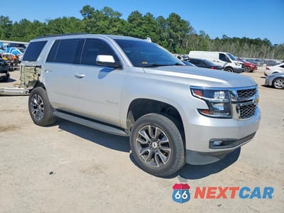 Czwarte zdjęcie samochodu z boku: 2020 CHEVROLET TAHOE K1500 LT VIN:1GNSKBKC7LR203772 - miniatura
