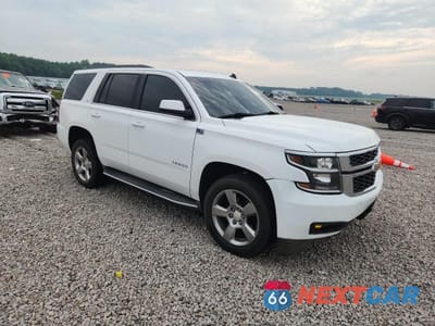 Czwarte zdjęcie samochodu z boku: 2015 CHEVROLET TAHOE K1500 LT VIN:1GNSKBKCXFR166124 - miniatura