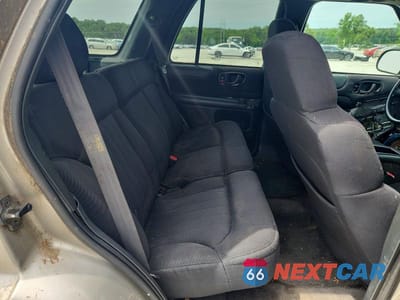 Zdjęcie 11 z 13 samochodu: 2003 CHEVROLET BLAZER VIN:1GNCS13X43K172621 - miniatura