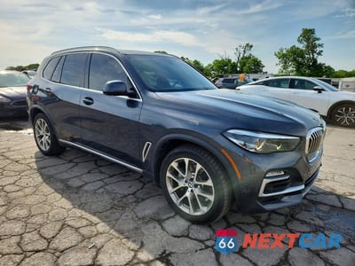 Czwarte zdjęcie samochodu z boku: 2021 BMW X5 XDRIVE40I VIN:5UXCR6C00M9F91922 - miniatura