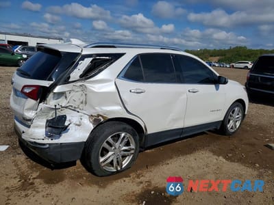 Trzecie zdjęcie samochodu z tyłu: 2018 CHEVROLET EQUINOX PREMIER VIN:2GNAXVEVXJ6339804 - miniatura