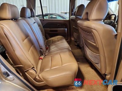 Zdjęcie 11 z 13 samochodu: 2006 HONDA PILOT EX VIN:2HKYF18716H557620 - miniatura