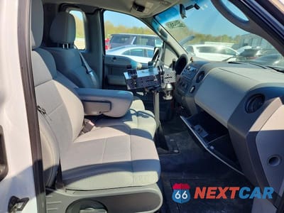 Zdjęcie 10 z 12 samochodu: 2007 FORD F150 VIN:1FTPF12V47KC40209 - miniatura