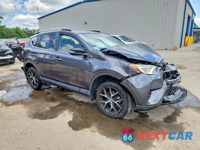 Czwarte zdjęcie samochodu z boku: 2018 TOYOTA RAV4 SE VIN:JTMJFREV6JJ208018 - miniatura