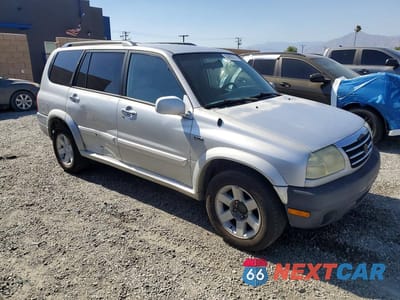 Czwarte zdjęcie samochodu z boku: 2002 SUZUKI GRAND VITARA XL7 LIMITED VIN:JS3TY92V824107166 - miniatura