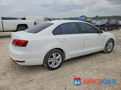 Trzecie zdjęcie samochodu z tyłu: 2013 VOLKSWAGEN JETTA HYBRID VIN:3VW637AJ2DM229443 - miniatura