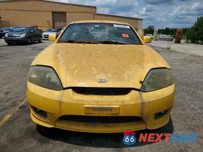 Piąte zdjęcie samochodu w środku: 2005 HYUNDAI TIBURON GT VIN:KMHHN65F75U175216 - miniatura