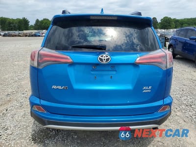Zdjęcie 6 z 12 samochodu: 2016 TOYOTA RAV4 XLE VIN:JTMRFREV8GJ083227 - miniatura