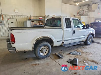 Trzecie zdjęcie samochodu z tyłu: 1999 FORD F250 SUPER DUTY VIN:1FTNX20F9XEC41912 - miniatura