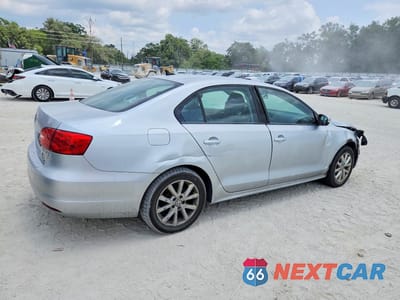 Trzecie zdjęcie samochodu z tyłu: 2011 VOLKSWAGEN JETTA SE VIN:3VWDZ7AJ2BM361458 - miniatura