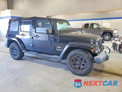 Czwarte zdjęcie samochodu z boku: 2015 JEEP WRANGLER UNLIMITED SAHARA VIN:1C4HJWEG5FL732964 - miniatura