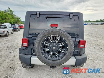 Zdjęcie 6 z 14 samochodu: 2012 JEEP WRANGLER UNLIMITED SAHARA VIN:1C4BJWEG8CL184802 - miniatura