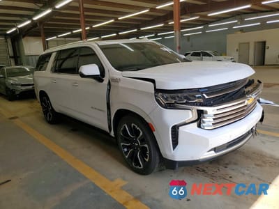 Czwarte zdjęcie samochodu z boku: 2024 CHEVROLET SUBURBAN K1500 HIGH COUNTRY VIN:1GNSKGKL0RR229510 - miniatura