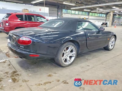 Trzecie zdjęcie samochodu z tyłu: 2003 JAGUAR XK8 VIN:SAJDA42C232A32507 - miniatura