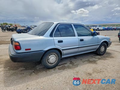 Trzecie zdjęcie samochodu z tyłu: 1990 TOYOTA COROLLA DLX VIN:1NXAE94A6LZ086839 - miniatura